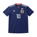 Blue sports jersey with branding on a white surface