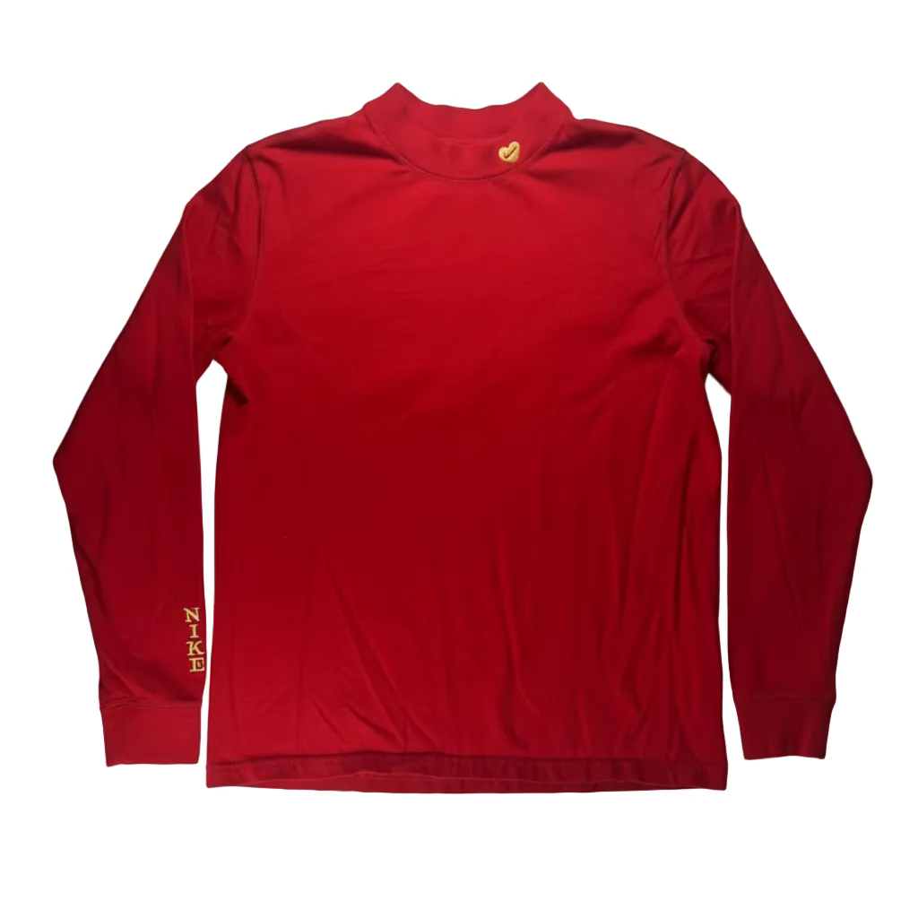 Red long-sleeve shirt with gold logos on a white background