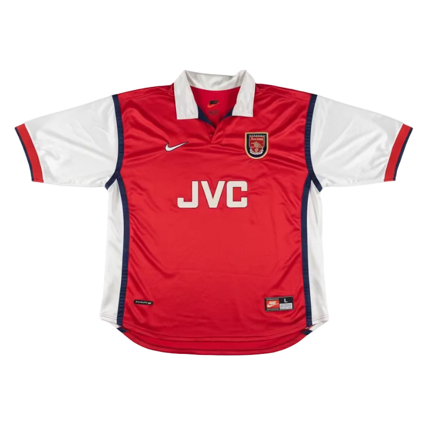 Red sports jersey with white collar and 'JVC' branding on a white background