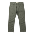 Green pants on a white surface with a blurred background