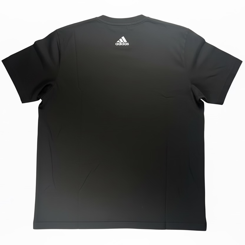 Black Adidas t-shirt on a white surface